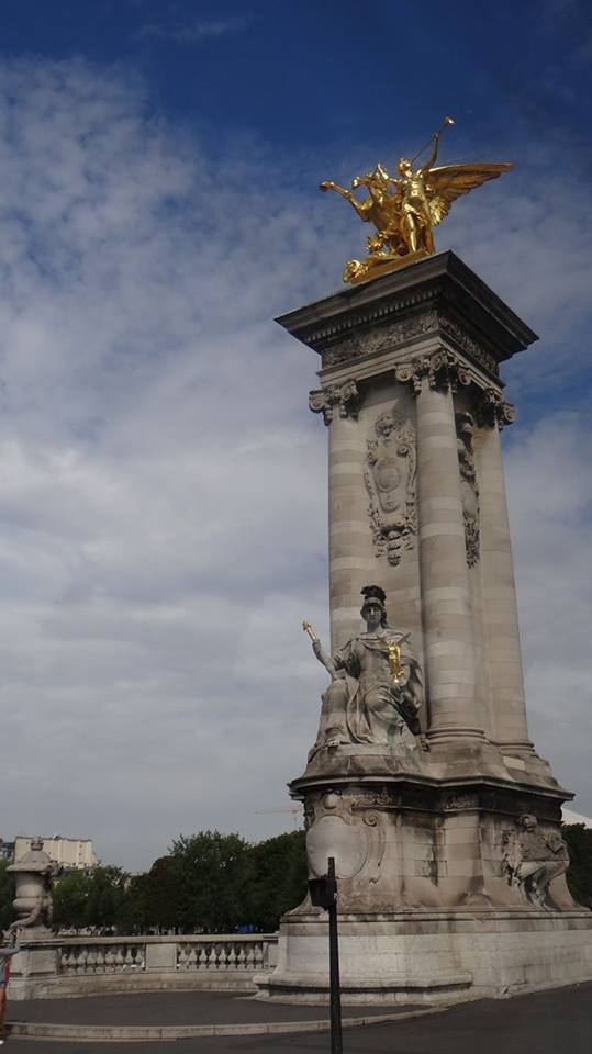 Ornate column of the pont alexandre iii bridge, Paris